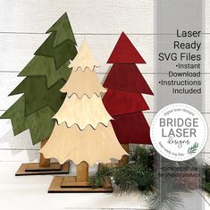 three wooden christmas trees are on display in front of a white wall with the words laser ready svg files instant instructions included