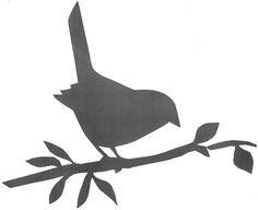 a black and white photo of a bird on a branch