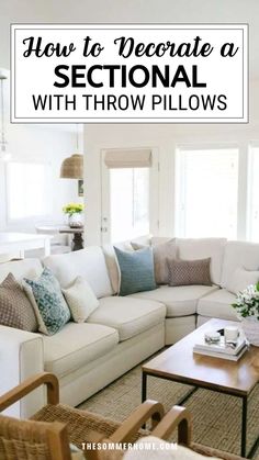 a living room with white couches and pillows on the sofa is featured in an article about how to decorate a sectional with throw pillows