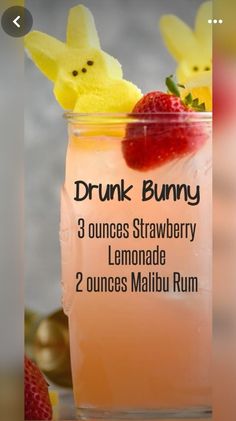 a drink with strawberries and lemons in it