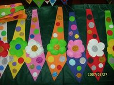 colorful paper flowers and polka dot ties are on display for the children to use in their crafts