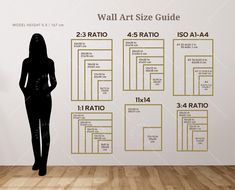 a woman standing in front of a wall size guide