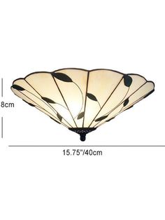 an image of a ceiling light fixture with leaves on the top and bottom, measurements for each