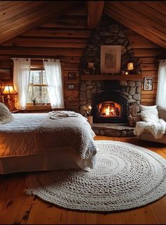 a bedroom with a fire place in the fireplace