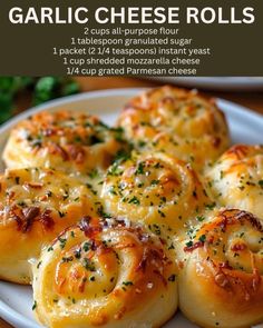 garlic cheese rolls on a white plate