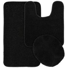 two black rugs and one black oven mitt