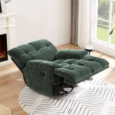 a green recliner sitting on top of a white rug