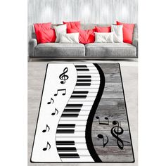 a living room area rug with musical notes on it and a piano keyboard in the middle