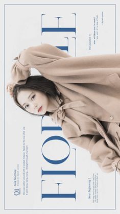 a woman in a trench coat on the cover of a magazine