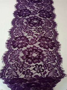 a purple lace with flowers on it