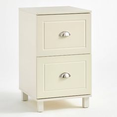 a white nightstand with two drawers on each side and an open drawer at the bottom