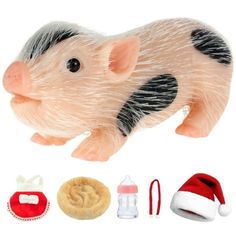 a toy hedgehog with its mouth open next to other toys and accessories on a white background