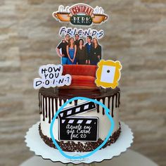 there is a cake that has been decorated to look like friends on the movie set