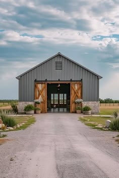 a large barn with an open front door