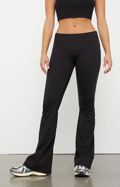 The PAC WHISPER Active Fold-Over Waistband Flare Yoga Pants from the PAC 1980 activewear collection make for the perfect piece for your next workout routine. These low-rise leggings have a fold-over waistband with flared leg openings and a tight figure-flattering fit. This piece is made with our PAC WHISPER™ fabric and has a buttery soft feel and quick-drying design that is perfect for working out or lounging around.Solid color leggings12" rise31.5" inseam22" leg openingButtery softQuick-drying4 Black Wide Leg Yoga Pants, Flare Leggings Low Rise, Low Rise Work Pants, Cute Yoga Pants, Clothes For College, Black Flare Leggings, Black Flared Leggings, Manifesting Board, Low Rise Leggings