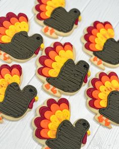 decorated turkey cookies on a white table