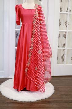 Beautiful peach red color saying long twin with organza Dupatta. The gown has lining and comes with tassels. Size:40 , 44 length: 55 inches Peach Anarkali Floor-length Dress, Peach Anarkali Dress For Festive Occasions, Red Organza Anarkali Gown, Red Anarkali Organza Gown, Red Anarkali Gown In Organza, Peach Anarkali Set For Party, Pink Chanderi Gown With Traditional Drape, Red Organza Floor-length Anarkali Set, Pink Chanderi Wedding Dress