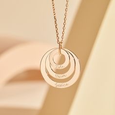 They say three's a crowd, but not with our Personalized Eternity Trio Necklace. Created to symbolize the special moments in your life, add a hand-engraved message to each ring.18K Champagne Gold Plated or 925 Sterling SilverCircles: 1.2”, 0.9” and 0.6” in diameterCharms are removable from this chain and can be worn on all Merci Maman chain lengthsHand-engraved in our Paris workshopSent with love in a complimentary gift boxAny slight variations in lettering depth, spacing and alignment from the e Rose Gold Round Jewelry With Engraving Option, Rose Gold Circle Jewelry For Anniversary, Personalized Yellow Gold Circular Jewelry, Rose Gold Laser Engraved Jewelry For Anniversary, Laser Engraved Rose Gold Jewelry For Anniversary, Personalized Round Jewelry For Promise, Round Jewelry With Polished Finish For Mother's Day, White Gold Jewelry For Anniversary, Promise Jewelry In White Gold With Hallmarks