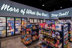 a grocery store filled with lots of food and drink items in it's aisles