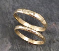 This ring will be custom made in your size after purchase. Please see policies page for the current timeline on completing custom work. His & Hers Custom Wedding bands 14k gold textured wedding ring set byAngeline. One of a kind wedding band for a one of a kind person. I hand carve these bands in wax and cast in my home studio. The smaller band is about 2mm wide the larger is about 3mm. Available in Rose (pink) white or yellow gold. This listing is for both rings. Please indicate size needed Textured Wedding Ring, Wide Wedding Rings, Custom Wedding Band, Green Amethyst Ring, Etsy Wedding Rings, Kind Person, Wedding Band Sets, Mens Band, Womens Wedding Bands