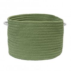 a large green rope basket on a white background