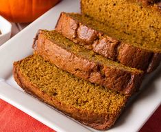 slices of pumpkin bread on a white plate