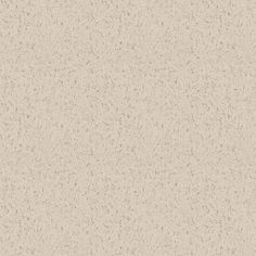 a beige background with speckles on it