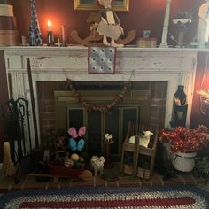 a living room filled with furniture and a fire place