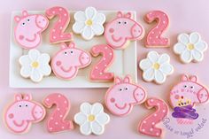 decorated cookies in the shape of animals and numbers