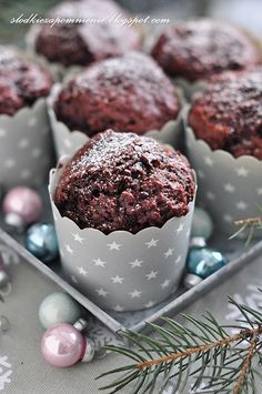 chocolate muffins in paper cups with christmas decorations