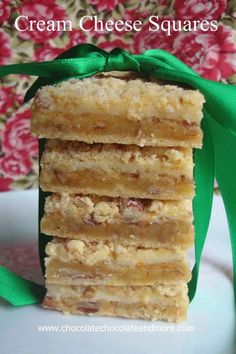 a stack of creme cheese squares on a plate