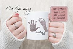 a woman holding a coffee mug with her hand and foot prints on it, in front of the caption