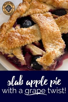 a blueberry pie on a white plate with the words, slab apple pie with a grape twist