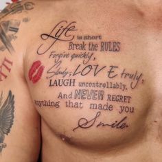 a man with tattoos on his chest saying life is short break the rules