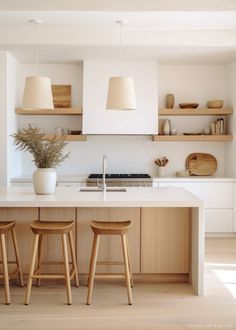 two stools are in front of the kitchen island