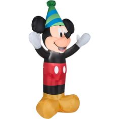 a mickey mouse balloon with a party hat on it's head and arms in the air