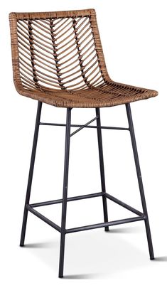 a brown rattan bar stool with black metal frame and foot rests on an isolated white background