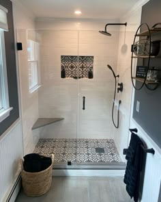 a walk in shower sitting next to a window