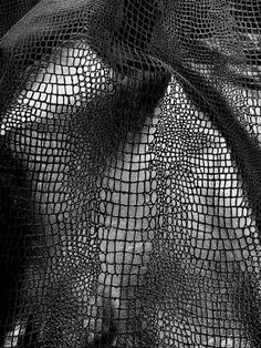 a black and white photo of a mesh bag