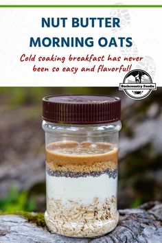 a jar filled with oats sitting on top of a tree stump next to a sign that says nut butter morning oats