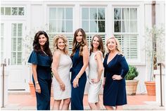 a group of women standing next to each other