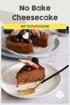 a piece of chocolate cheesecake on a white plate with a fork and blackberries