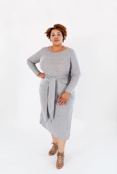 Get a casual look with our midi dress that never looks out of style. Jenna Dress made from ultra-soft and stretchy fabric that wraps around your body perfectly and gives you a comfortable fit. Dress style with wrap tied around the waist, round neckline, and side splits with full sleeves. Go on and get our beautiful warm and cozy outfit to enjoy winter days. Material: 68% Polyester, 28% Rayon, 4% Spandex Sleeve Length: Full Sleeves Dress Length: Below Knee Neck Style: Round Neckline Color: Grey S Dress Curvy, Full Sleeves Dress, Enjoy Winter, Sleeves Dress, Curvy Dress, Side Splits, Cozy Outfit, Fit Dress, Winter Days