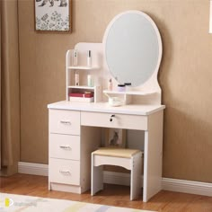 a small white vanity with a mirror and stool