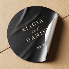 Elegant simple minimal wedding invitation black envelope seal sticker featuring a classy stylish chic trendy faux shinny gold calligraphy script.