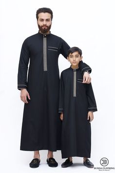 This thobe is artistic and clean cut. You can make a lasting impression with this Jubba. This thobe is in Pure black fabric and has gold color embroidery. This Thobe is a safe bet for any occasion. The embroidery on this thobe is not a coded message but it is simply Arabic calligraphy. Design Specifications Special Design Band Collar 1 ½ Inch Standard Placket 1 ½ Inch Wide Simple Round Cuffs, 1 ½ Inch Calligraphy Embroidery on Placket Border Lining on Collar and Cuffs Double Side Pockets, No Top Black Thobe, Calligraphy Embroidery, Coded Message, Arabic Calligraphy Design, Color Embroidery, Pure Black, Calligraphy Design, Band Collar, Clean Cut