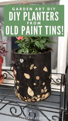 a potted plant sitting on top of a window sill with the words garden art diy plants from old paint tins