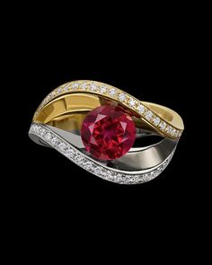 Covet duo ring is curvaceous and enchanting. This ring displays a beautiful rubellite tourmaline between curves of yellow and white gold, embellished with diamond pavé.