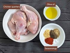 ingredients to make chicken curry in bowls on a wooden table, including spices and seasonings