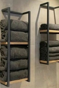 two shelving shelves with towels on them in a bathroom